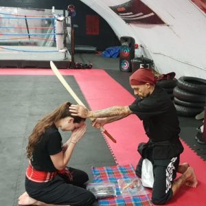 Steffi earns Nakdab level I at Tactical Thai Sword London with Kru Nuat